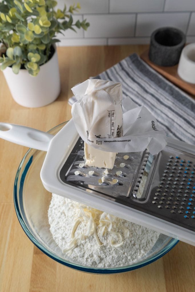 Grating the frozen butter directly into the dry ingredients