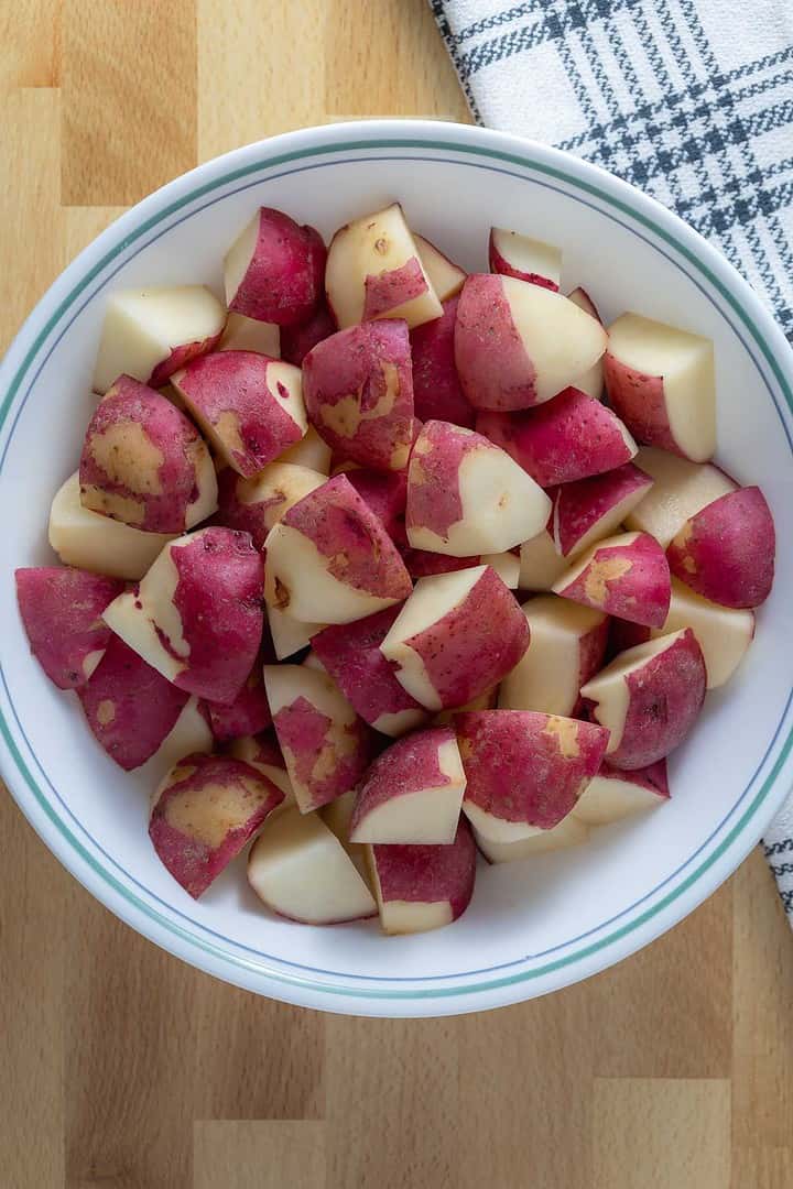 Prepping the potatoes is simple for an easy vegan side dish or vegan BBQ dish