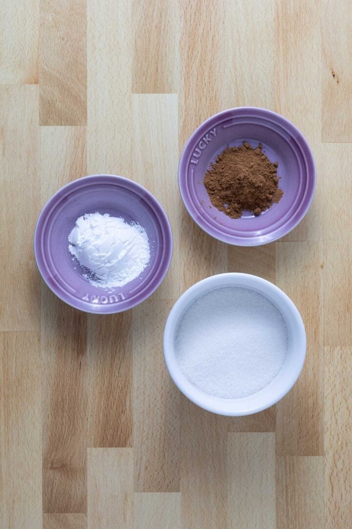 Sugar, apple pie spice, and tapioca starch for the vegan apple pie recipe