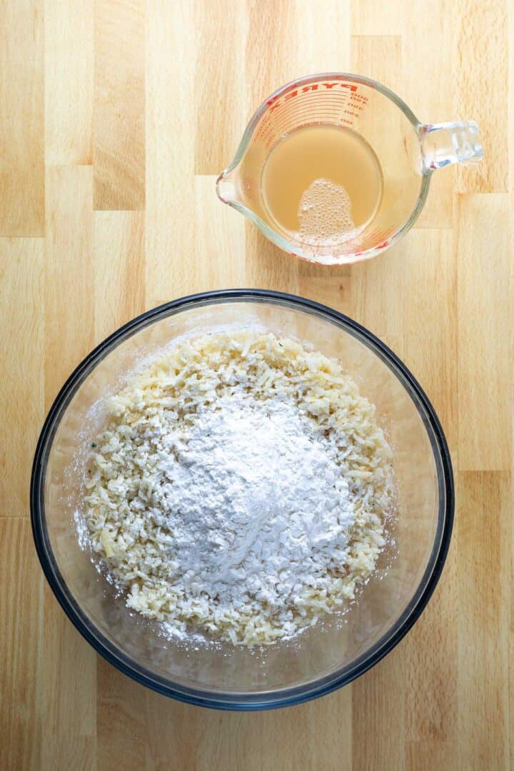 Adding starch to the hash brown patty recipe in the mixing bowl