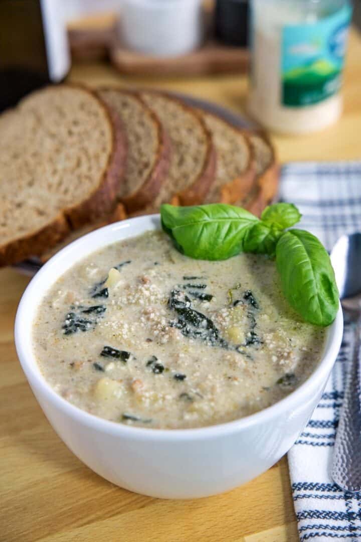 A bowl of reheated vegan Zuppa Toscana