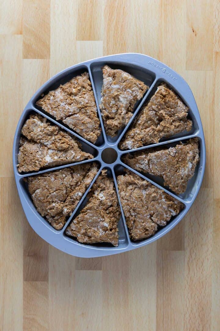 A Nordicware Scone Pan filled with the frozen scone triangles