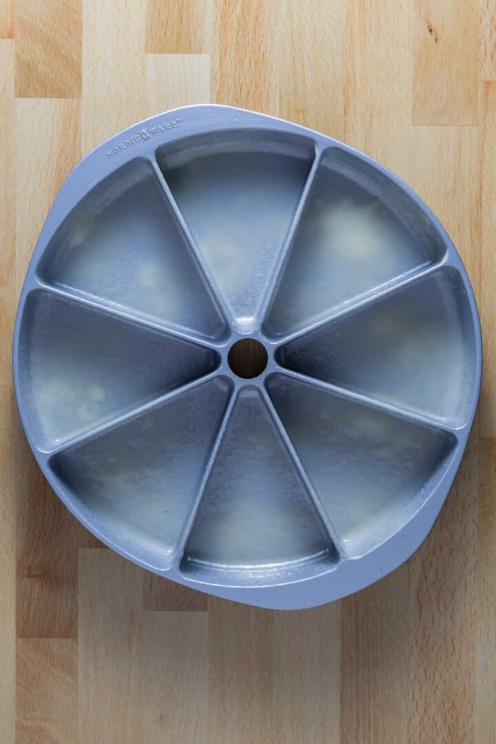 A Nordicware Scone Pan greased with baking spray