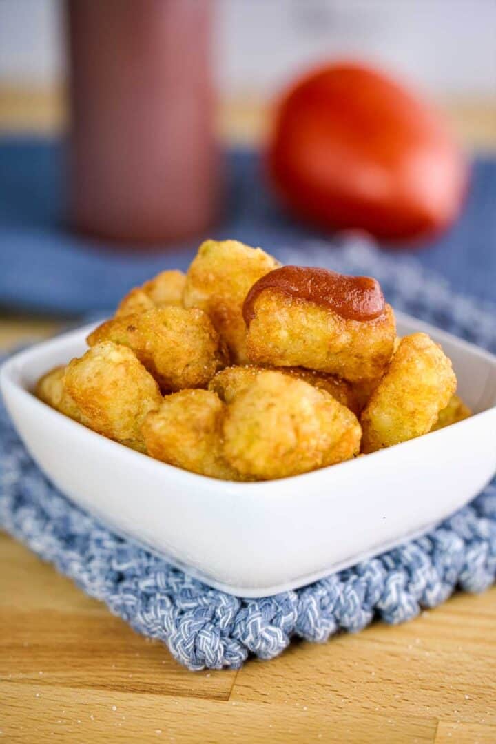 Some of our homemade ketchup on a tater tot
