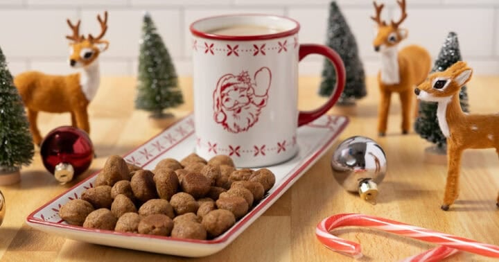 A plate of vegan holiday cookies called kruidnoten in a special Sinterklaas scene