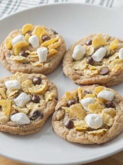 Feature photo for this recipe post of 4 Milk Bar Cornflake Cookies on a Serving Plate