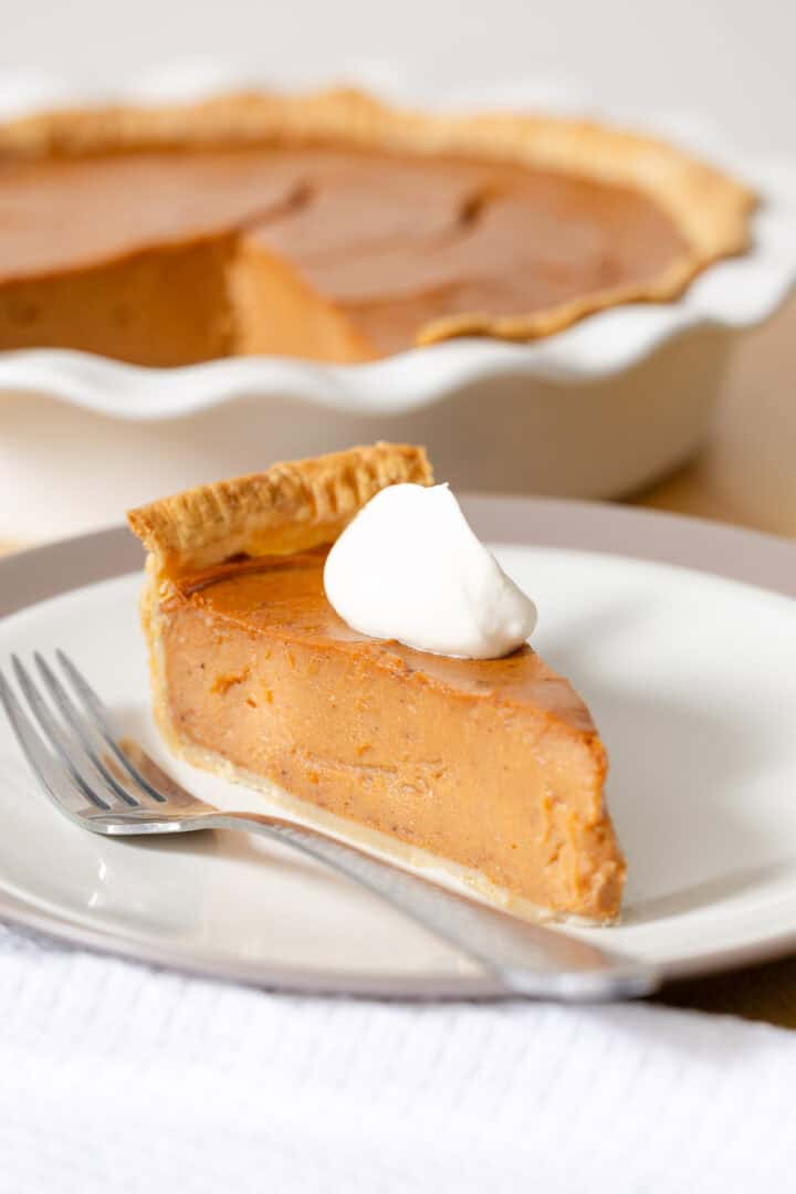 A slice of vegan sweet potato pie made with silken tofu