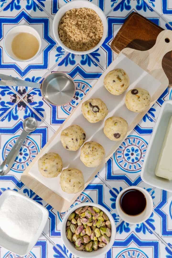 Vegan cookies made with this recipe rolled into balls and ready to be baked