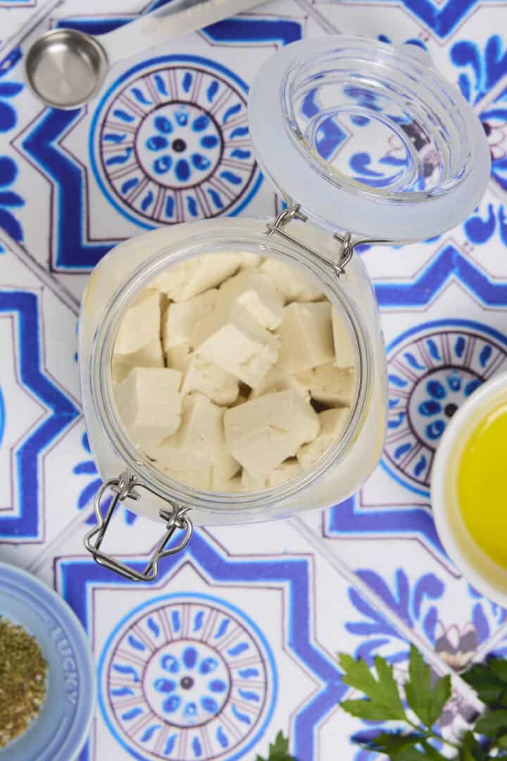 Cooked tofu cubes in a jar